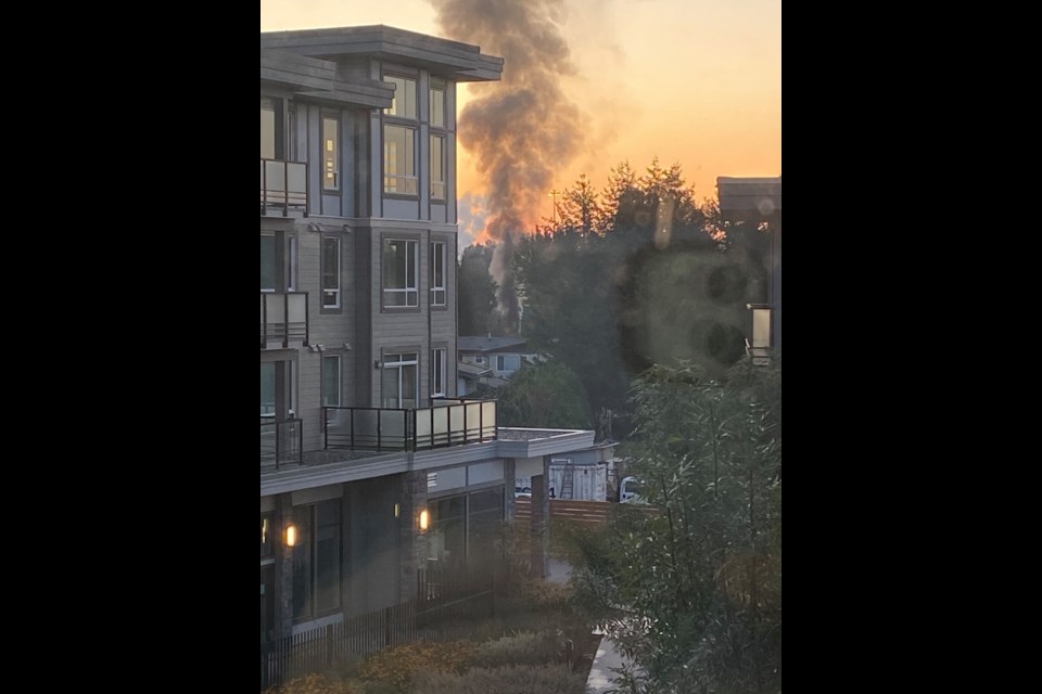 Black plumes of smoke caused by a vehicle fire in east Richmond