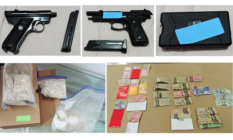 Weapons seized during a raid on a Richmond address included guns and Tasers
