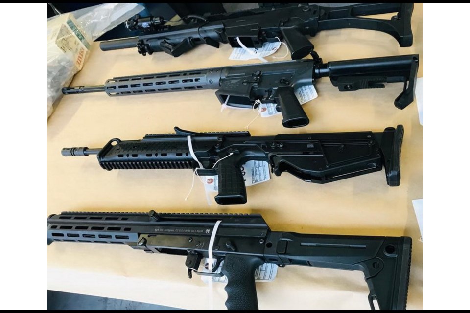 Five carbine-style rifles, three pistols and five sound suppressors were among the items seized during the investigation into three alleged clandestine drug labs in Richmond.