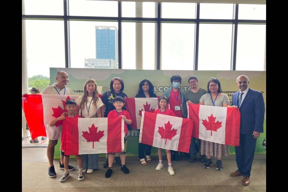 Four Richmond UCMAS students competed and won awards at an international math competition in Malaysia.