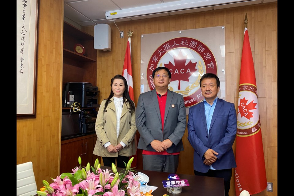 Renming Wei, acting chairman of Canadian Alliance of Chinese Associations (CACA) (in middle), said they aim to make a change this year by encouraging more people to get out to vote. 