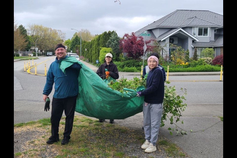 Volunteers pulled the equivalent of 72 bathtubs full of invasive blackberry bushes from an area in King George Park.