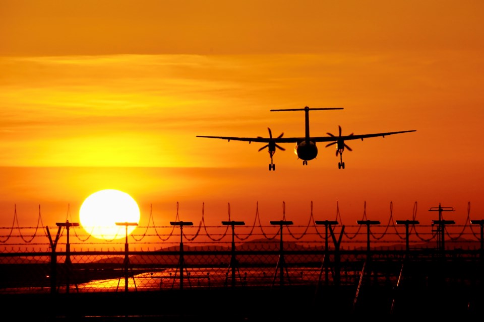 lay-tan-airplane-sunset-yvr