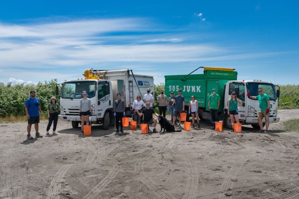 Volunteers from Richmond companies 505-Junk and Platinum Pro Claim Restoration recently completed a shoreline cleanup at Triangle Beach, removing about 7,000 pounds of dumped debris.