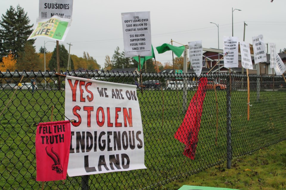 A group of protesters with Extinction Rebellion Vancouver blocked a major intersection leading to Vancouver International Airport while calling for an end to subsidies in the fossil fuel industry.