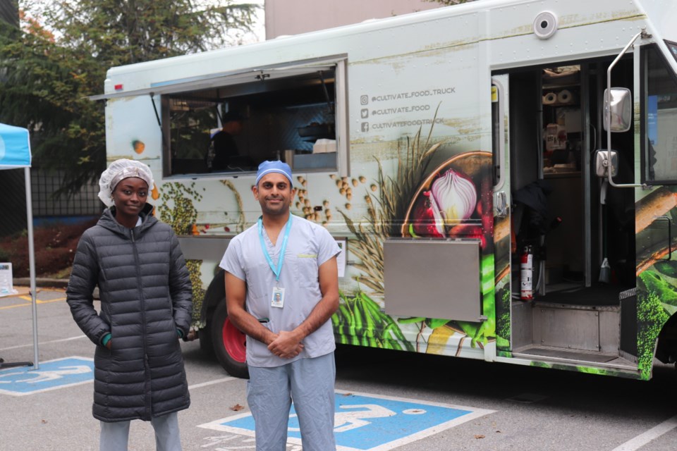 Dr. Sharadh Sampath, head of general surgery at Richmond Hospital (right), who co-founded the ElevATE Society and Cultivate food truck, and Ekua Yorke (left), a metabolic and bariatric surgeon and member of the ElevATE board.