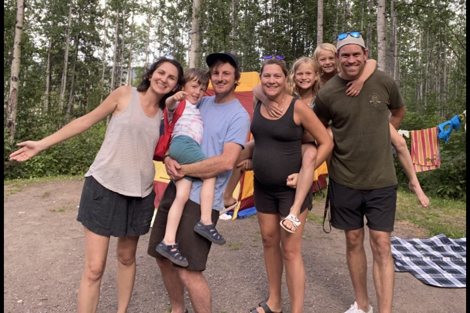 Katya Ballos (left) with her son Oscar and husband, Jason Trigg, along with the Eller family, Rachel and Jordan and their kids Olivia and Maren during a camping trip this summer