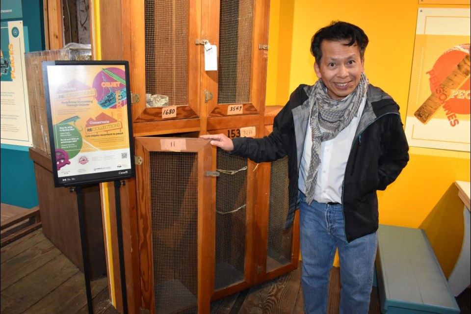 Gulf of Georgia marketing manager shows historic lockers that will be part of a two-year exhibit at the historical site.