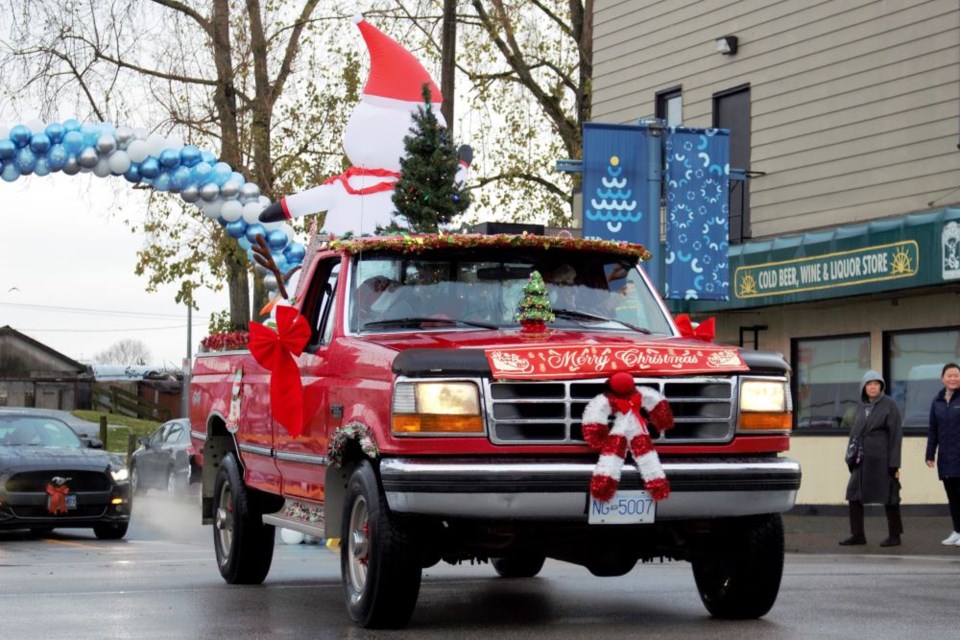 Classic cars decked out for the holidays paraded through Steveston for the Annual Christmas Classic Car Cruise.
