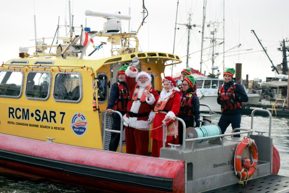 Santa and Mrs. Claus arrived in Steveston aboard an RCMSAR rescue vessel.