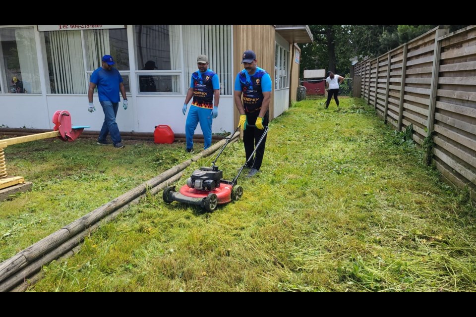 Phoenix Richmond Malayalee Association cleaned, planted flowers for Brighouse United Church on World Environment Day.