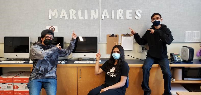 Student execs vice president Keyaan Jaffer (left), president Aneeya Johal (center) and vice president Walter Tse of Marlinaires, a social responsibility club, at Matthew McNair sent digital thank you cards to LifeLabs' employees.