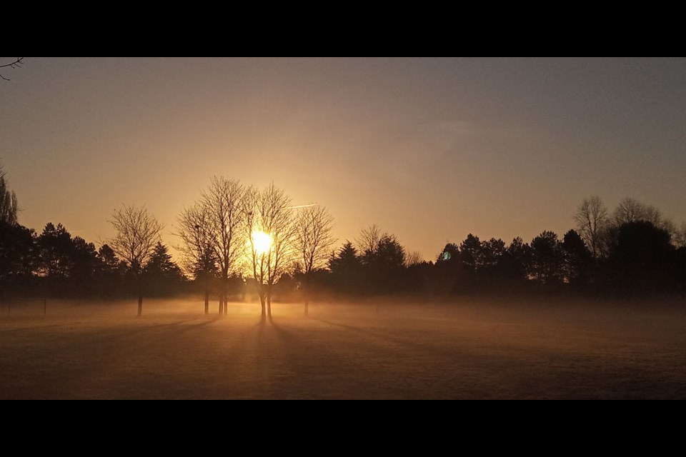 The sun starting to rise over South Arm Park in Richmond