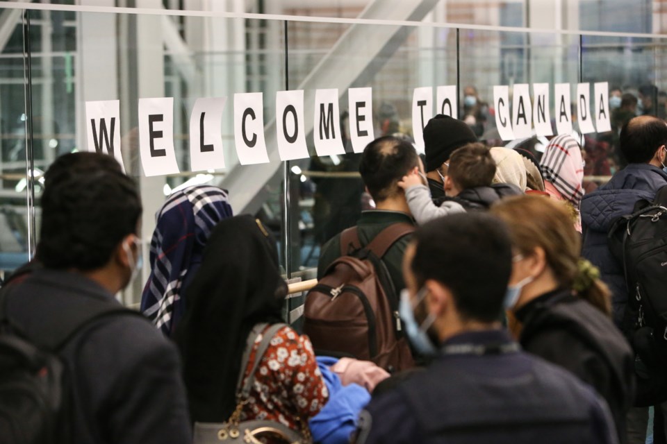 More than 200 Afghan refugees landed at Vancouver International Airport last night.