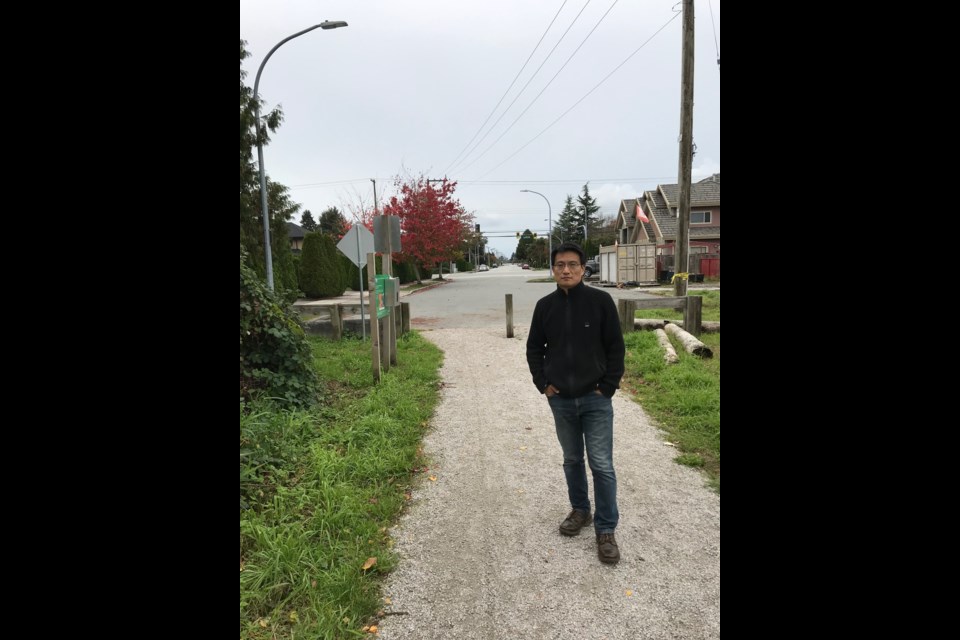 Yonghua Ge has launched a petition calling on the City of Richmond to pave part of the Francis Road Trail to help reduce traffic volumes on his neighbourhood street. 