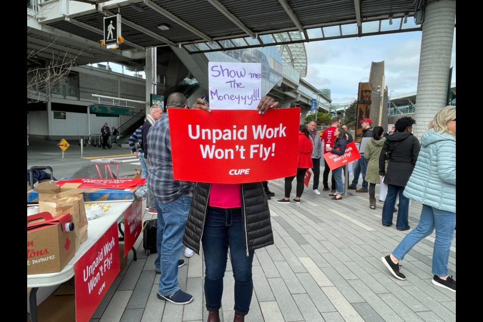 200 flight attendants gathered at YVR on Tuesday morning to end unpaid work.