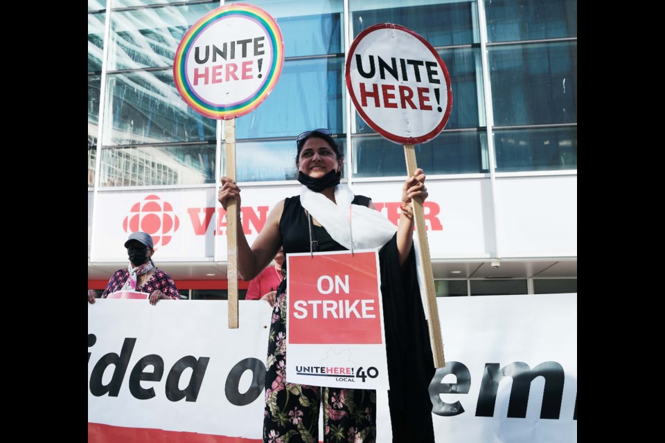 UNITE Here Local 40 members who used to work at the Pacific Gateway Hotel in Richmond protested outside the federal government offices in Downtown Vancouver on Thursday