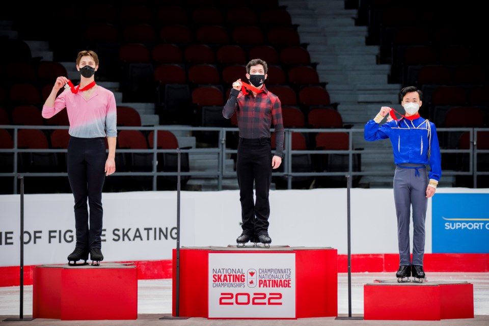 Richmond's Wesley Chiu (right) took bronze at the men's nationals in Ottawa at age 16