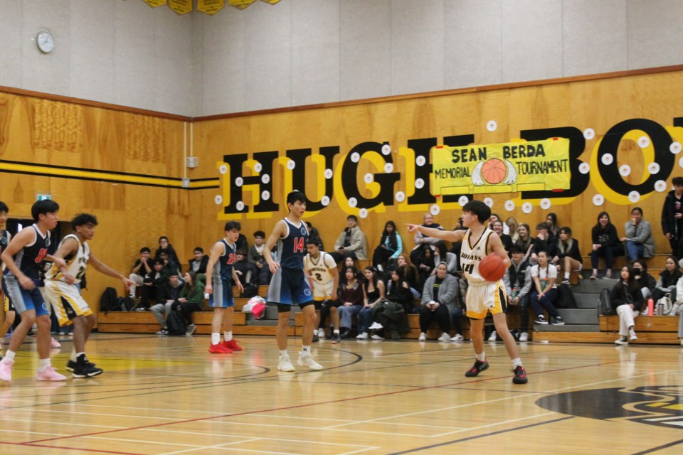 Hugh Boyd versus Burnett senior boys basketball teams at the first annual Sean Berda Memorial Basketball Tournament.