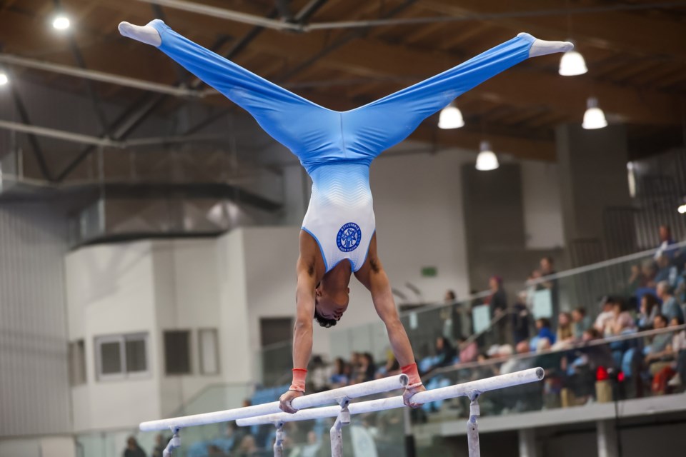 Richmond gymnast Kiran Nadkarni on the parallel bars at the  2025  Artistic and Trampoline Gymnastics B.C. Championships.