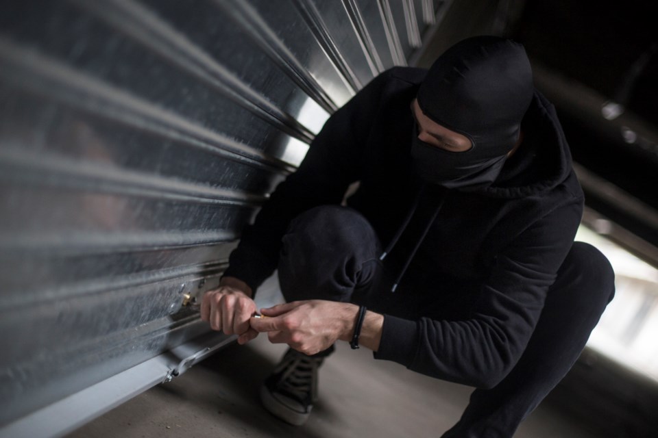 thief-burglar-garage-break-in