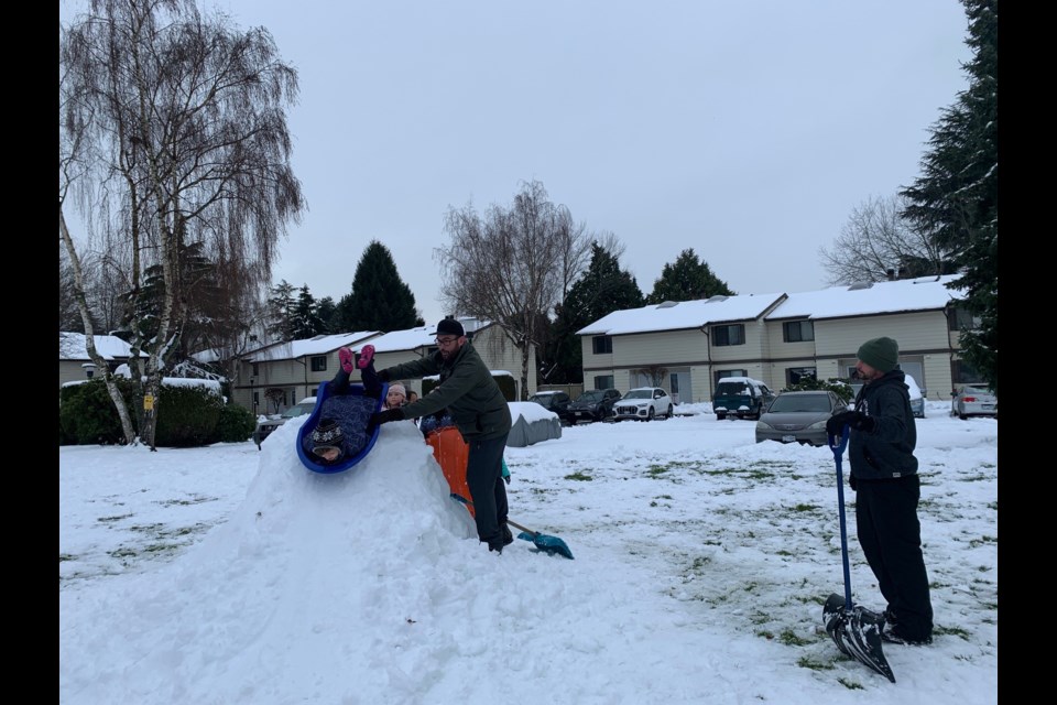 A large area of snow was cleared from this Steveston neighbourhood to make a "toboggan hill" in the village