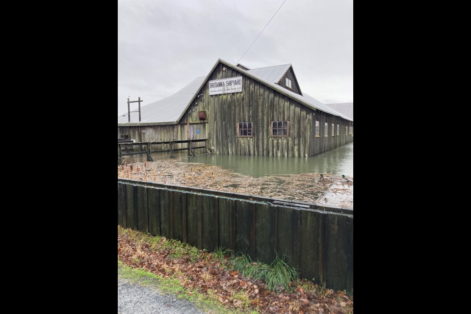 Tuesday morning's storm surge was doing its best to breach the flood walls at Britannia Heritage Shipyards in Steveston