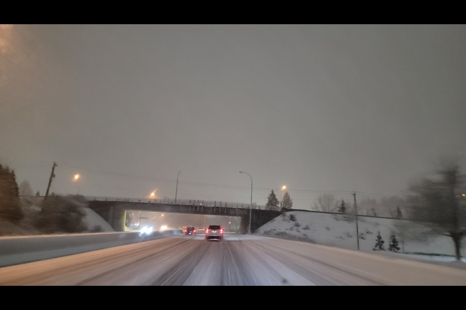 Snow blanketed Knight Street Bridge entering Richmond on Satirday night.