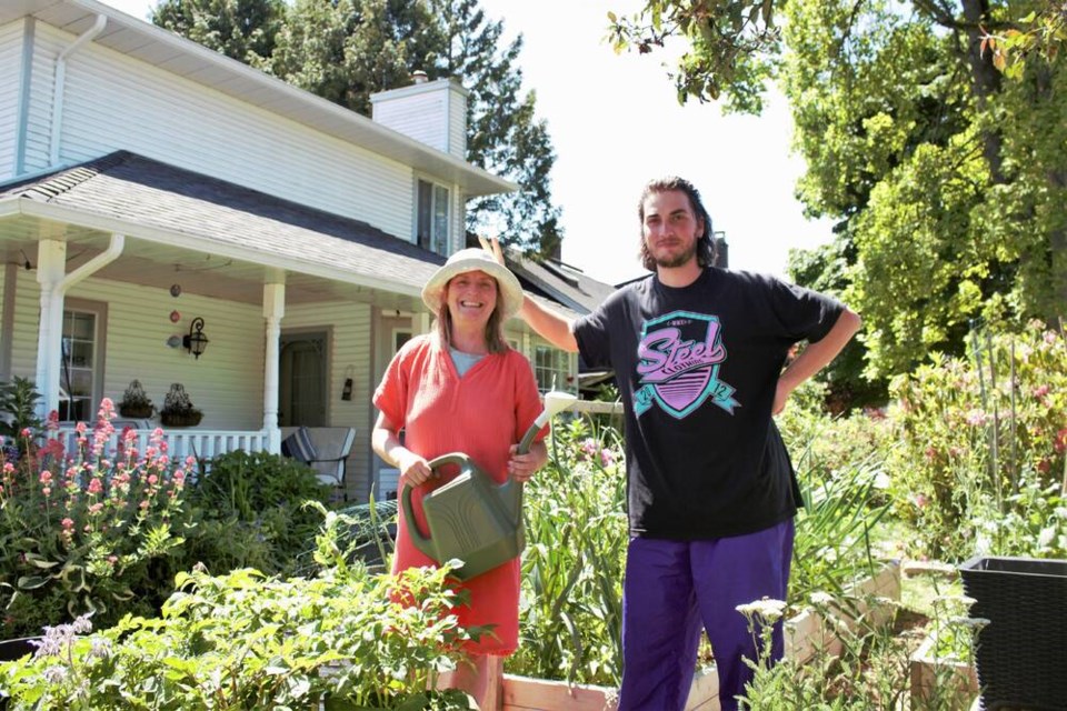 Berenice and Ashton Pawlik started planting vegetables during the COVID-19 pandemic and have been enjoying it ever since. (Vikki Hui) 