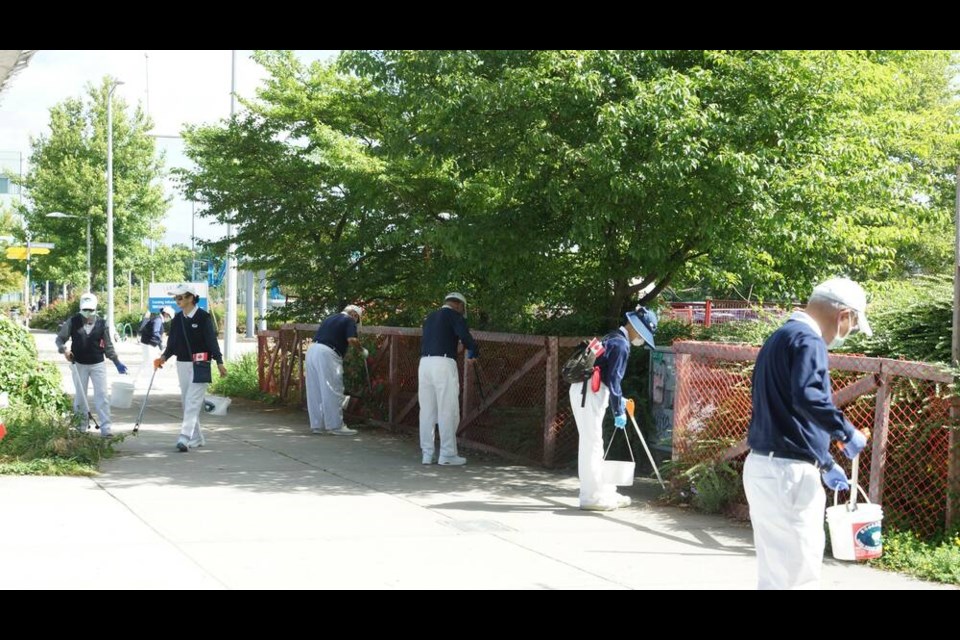Volunteers from the Tzu Chi Foundation were busy cleaning Richmonds streets on Canada Day 