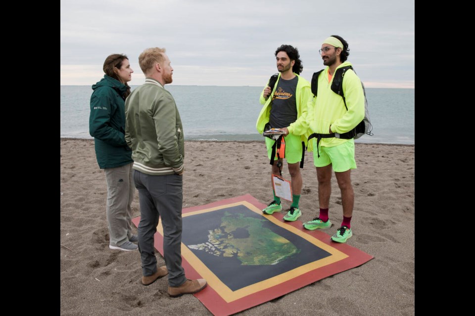 Derek Gerard (second right) and Jaspal Sidhu (far right) learn their elimination fate from Amazing Race Canada host Jon Montgomery (second left) 