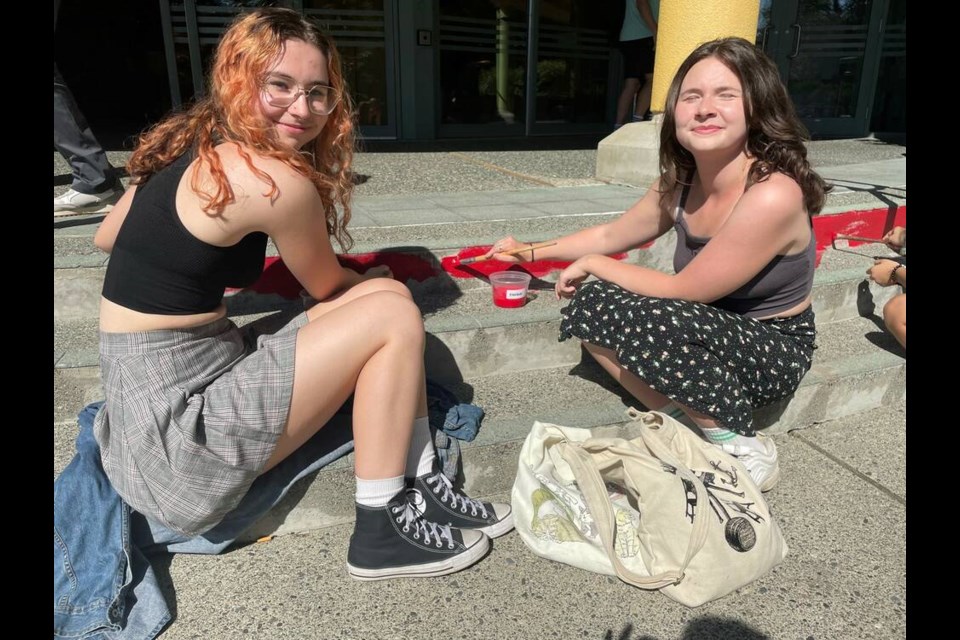 Richmond youth were repainting the library stairs in rainbow colours to celebrate the LGBT community. 