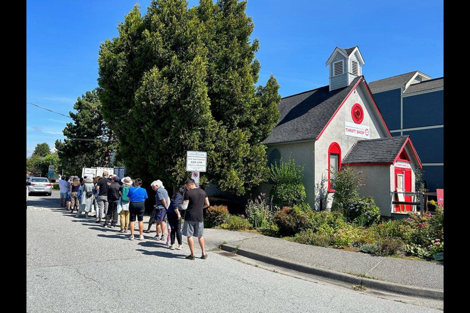 People were waiting to get into a charity thrift store on Chatham Street. Ingrid Veilleux photo 