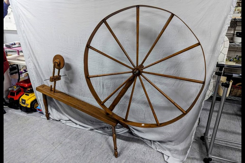 This giant, wooden spinning wheel was donated to a thrift store in Steveston. 