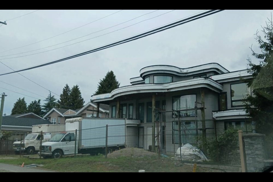 A house on Dallyn Road has been under construction since 2004. Photo submitted 