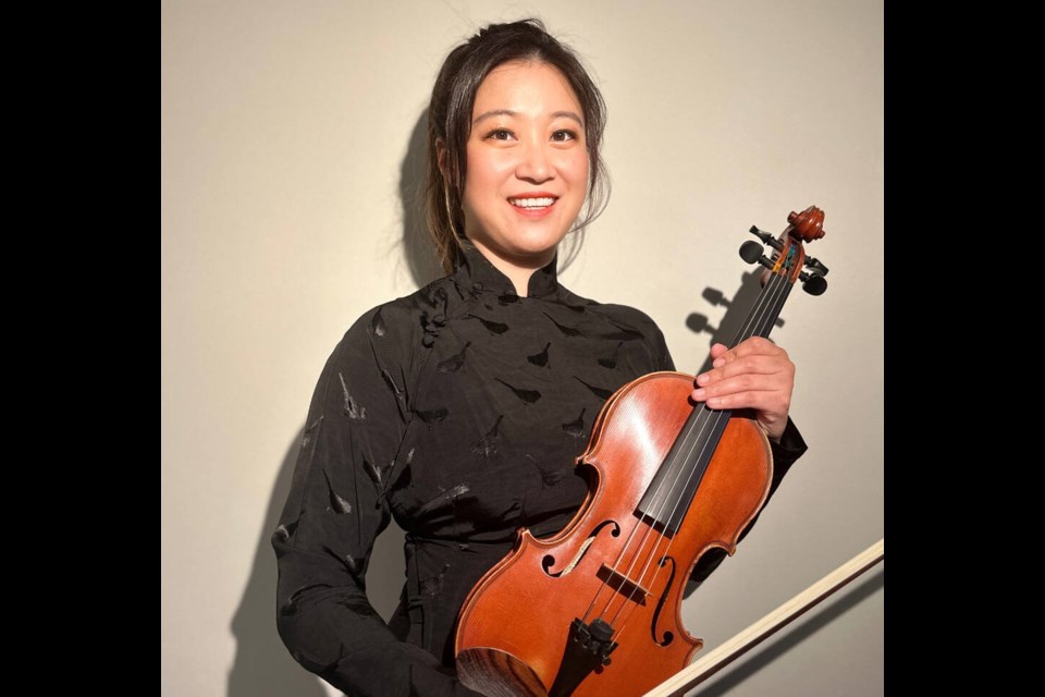 Sunny She plays violin in the Vancouver Symphony Orchestra will perform the famous score during a movie screening 