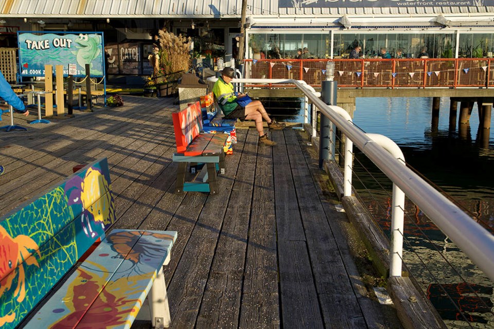 The painted benches along Steveston’s boardwalk are particularly beautiful on a sunny day. Grant McMillan photo 