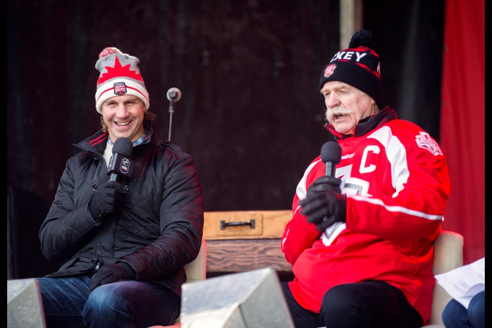 Ryan Smyth, left, and Lanny McDonald tell stories from their hockey careers to a Hometown Hockey afternoon crowd in Canmore in 2018. RMO FILE PHOTO 