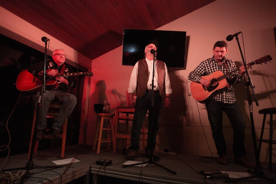 Mike Petroff, left, Gord March and Pat "Sully" Sullivan perform at Songs For Shelter in Canmore in 2019. RMO FILE PHOTO