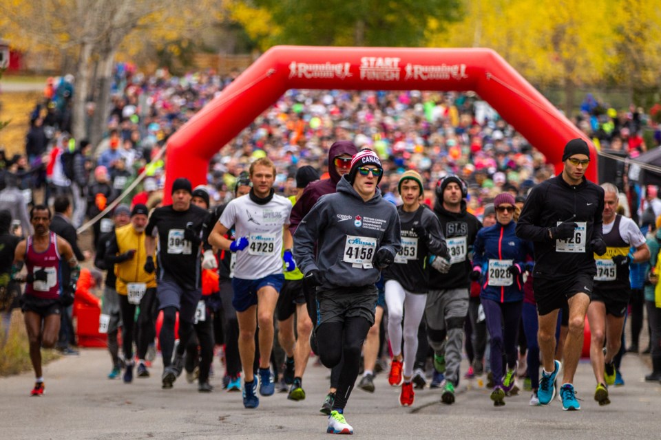 Participants in the five kilometre and 10 km distances race out of the start gate during the 40th annual Mel’s Road Race in Banff on Saturday, (Sept. 28). Evan Buhler RMO PHOTO