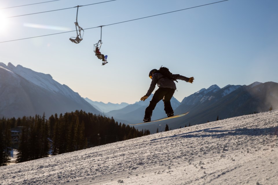 A snowboarder catches some air on the opening day of the season at Mt. Norquay in 2019. Evan Buhler RMO FILE PHOTO