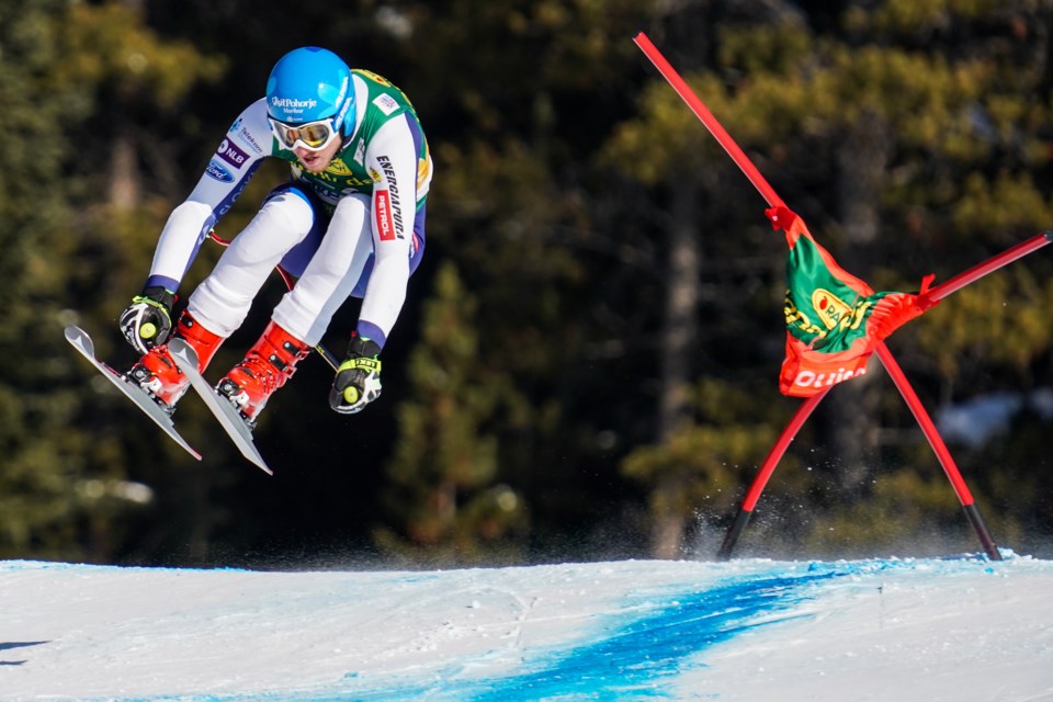Klemen Kosi of Slovenia soars through the air after clipping a gate during the men’s super-G event in the 2019 Lake Louise Audi FIS Ski World Cup. RMO FILE PHOTO⁠