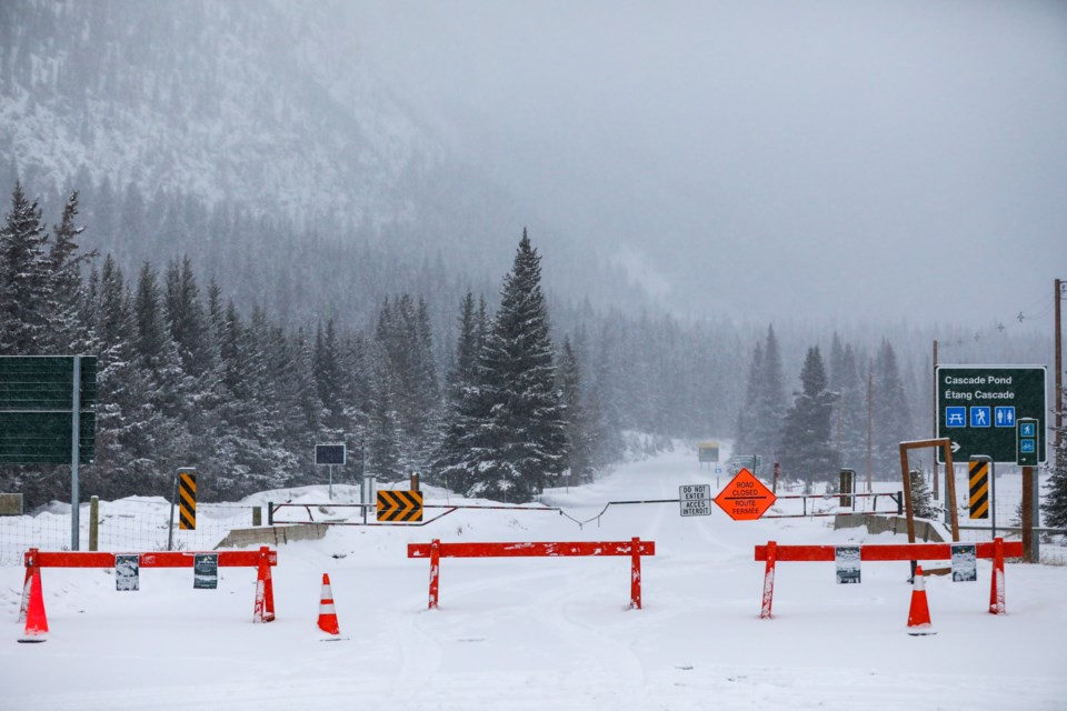 A road block restricts access to Lake Minnewanka on Wednesday (March 25). Parks Canada announced Tuesday (March 24) it is shutting down public access to national parks, including the backcountry, day-use areas and trails, to limit the spread of the COVID-19 virus. EVAN BUHLER RMO PHOTO⁠