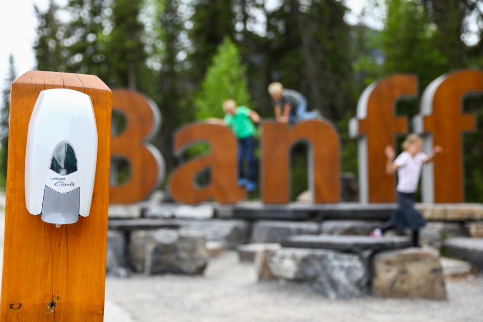 A hand sanitizer station has been set up at the popular “Banff” sign along Mt Norquay Road in Banff. EVAN BUHLER RMO PHOTO⁠