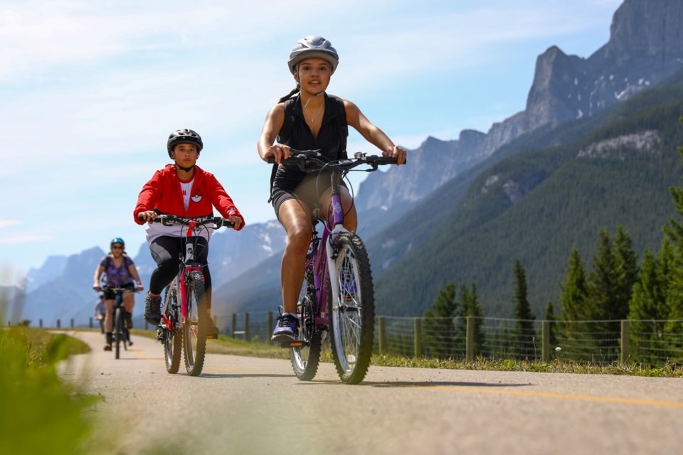 A group of cyclists rides along the Legacy Trail towards Banff on Saturday in 2020. RMO FILE PHOTO