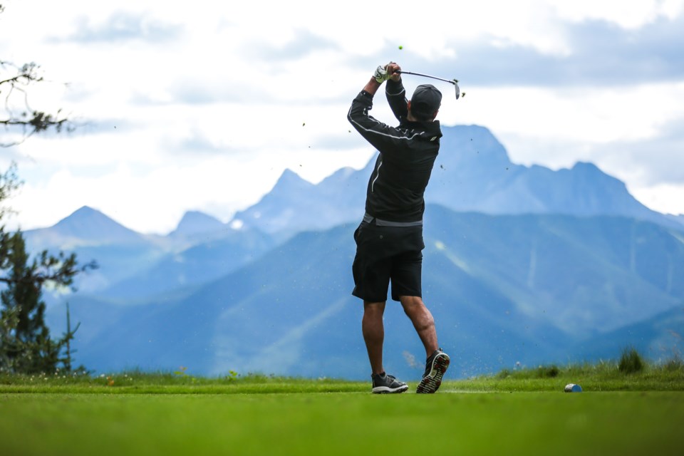 A golfers hits a tee shot on the 12th hole at Silvertip Resort on Friday (Aug. 7). This past July was the resort's best month in the past 10 years and the rest of the season has followed that trend. EVAN BUHLER RMO PHOTO