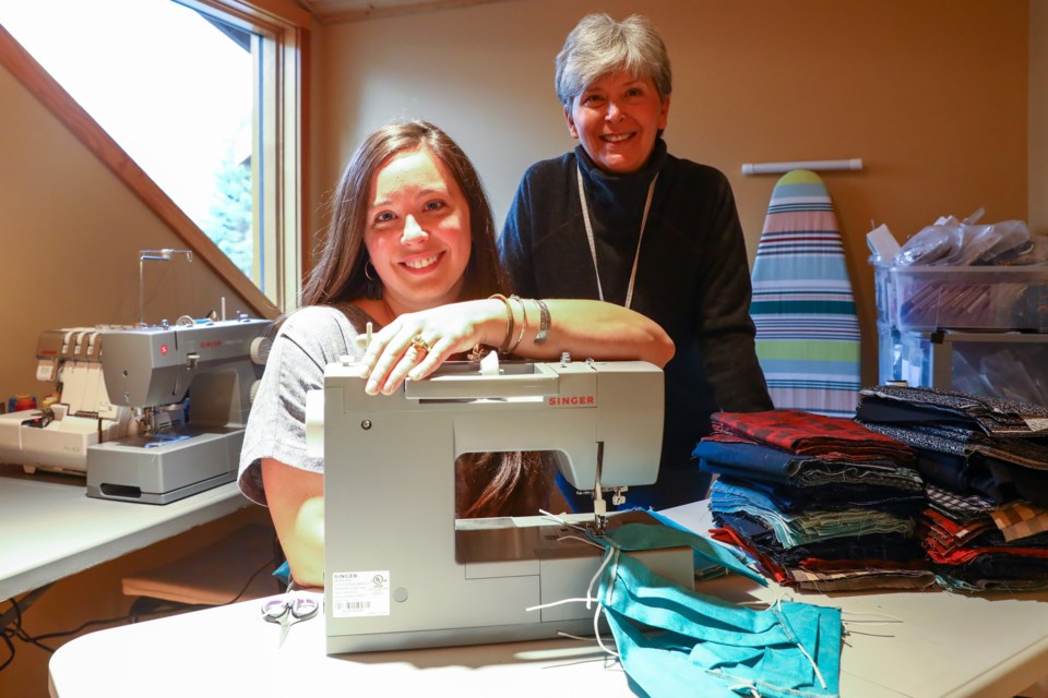 Canmore Mask Makers Sam Welsh and her mom Lorraine Lefort on Friday (Oct. 2). EVAN BUHLER RMO PHOTO