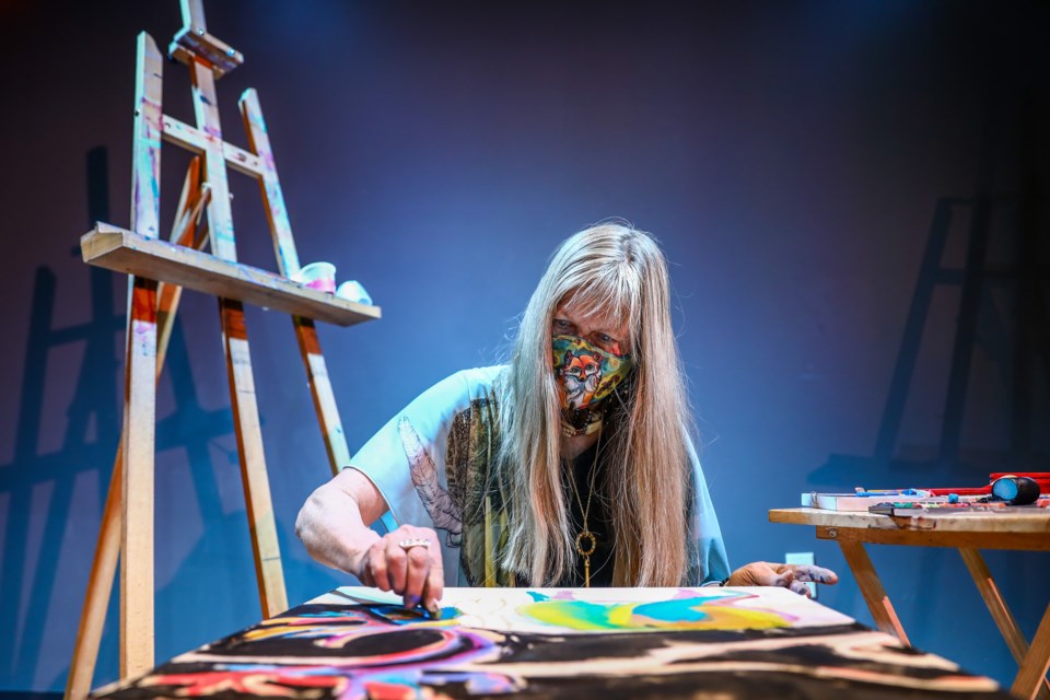 Canmore-artist Kathryn Cooke races against the clock to complete an original piece of artwork during the Creative Combat 6.0 at artsPlace on Saturday (Nov. 14). Twelve artists each had 20 minutes to complete an original piece of artwork. Pascale Ouelletâs oil on birch painting of a cattle skull racked up the most votes to be crowned the winner of the event. EVAN BUHLER RMO PHOTO