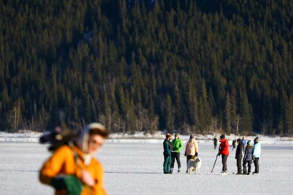 Hundreds of people skate on Lake Minnewanka in Banff National Park on Saturday (Jan. 23). Over the past 48 hours, four people have fallen through the ice at the popular skating spot. EVAN BUHLER RMO PHOTO