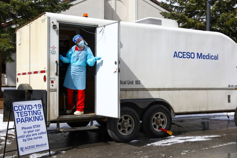 Alexandra Barker a nurse with ACESO Medical greets a patient at the pop-up COVID-19 assessment site in Banff on Saturday (April 10). EVAN BUHLER RMO PHOTO